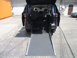 Blue Toyota Sienna with Driverge Rear Entry Manual Fold Out conversion