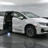 White Honda Odyssey with BraunAbility Side Entry Automatic In Floor conversion