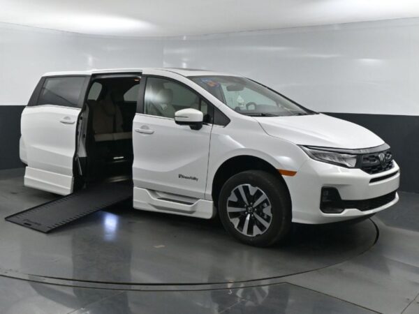 White Honda Odyssey with BraunAbility Side Entry Automatic In Floor conversion