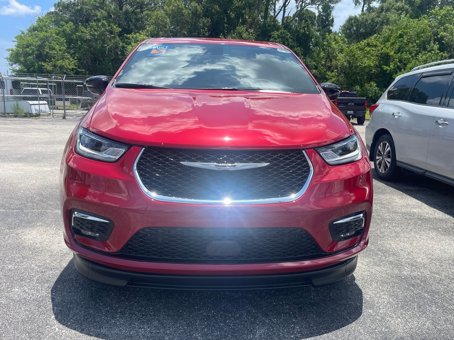 Red Chrysler Pacifica with BraunAbility Side Entry Automatic Fold Out conversion