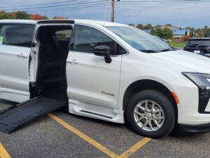 White Chrysler Pacifica with BraunAbility Side Entry Automatic Fold Out conversion