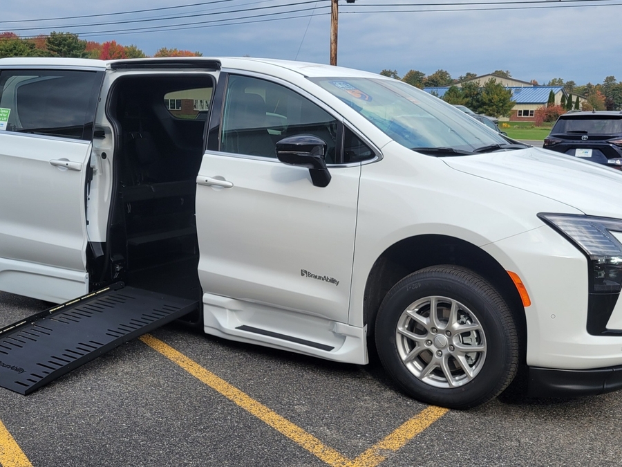 White Chrysler Pacifica with BraunAbility Side Entry Automatic Fold Out conversion