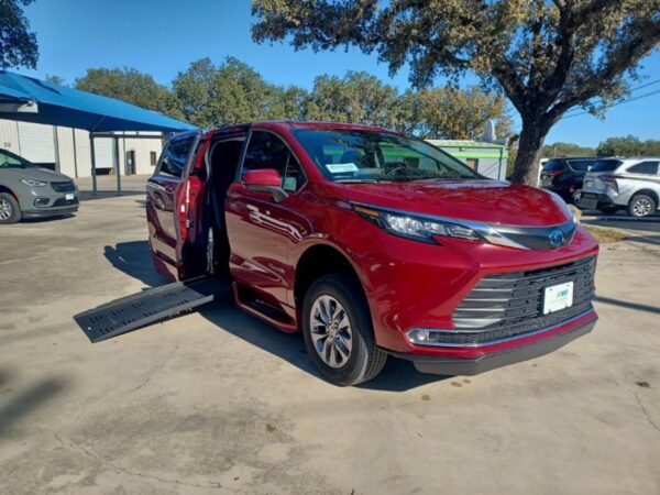 Red Toyota Sienna with BraunAbility Side Entry Automatic Fold Out conversion