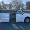 White Chrysler Voyager with BraunAbility Side Entry Automatic Fold Out conversion