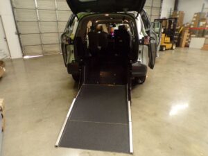Silver Toyota Sienna with Driverge Rear Entry Manual Fold Out conversion