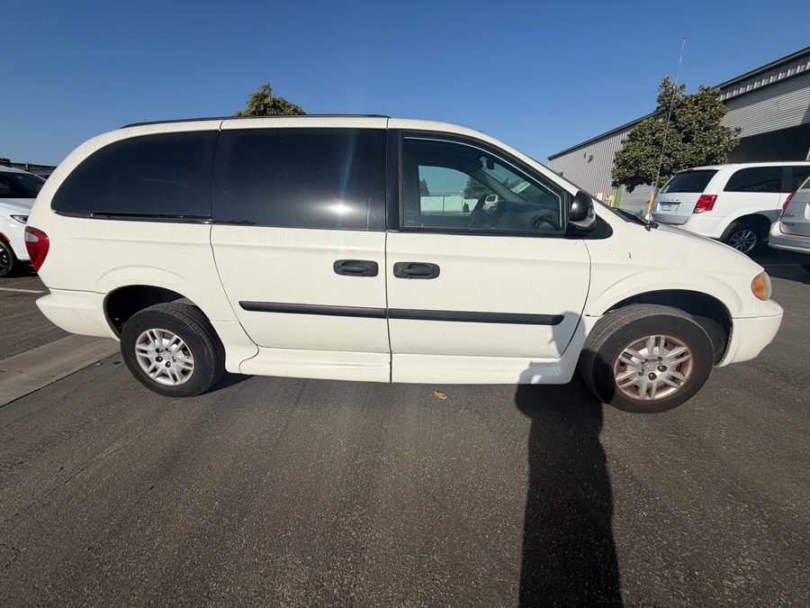 White Dodge Grand Caravan with Vantage Mobility Side Entry Automatic In Floor conversion