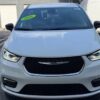White Chrysler Pacifica with BraunAbility Side Entry Automatic Fold Out conversion