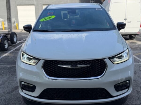 White Chrysler Pacifica with BraunAbility Side Entry Automatic Fold Out conversion