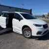 White Chrysler Pacifica with BraunAbility Side Entry Automatic Fold Out conversion