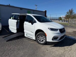 White Chrysler Pacifica with BraunAbility Side Entry Automatic Fold Out conversion