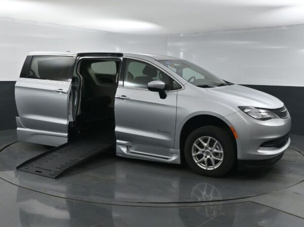 Silver Chrysler Voyager with BraunAbility Side Entry Automatic Fold Out conversion