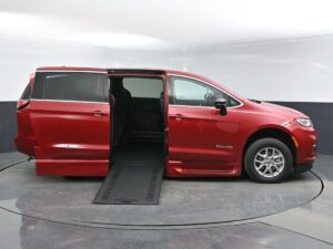 Red Chrysler Pacifica with BraunAbility Side Entry Automatic In Floor conversion