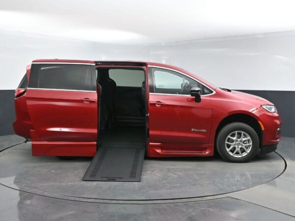 Red Chrysler Pacifica with BraunAbility Side Entry Automatic In Floor conversion