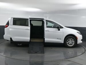 White Chrysler Voyager with BraunAbility Side Entry Manual Fold Out conversion