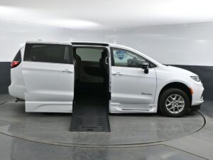 White Chrysler Pacifica with BraunAbility Side Entry Automatic Fold Out conversion