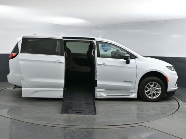 White Chrysler Pacifica with BraunAbility Side Entry Automatic Fold Out conversion