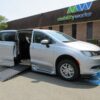 Silver Chrysler Voyager with BraunAbility Side Entry Automatic In Floor conversion