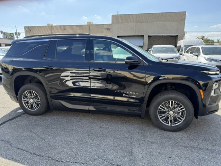 Black Chevrolet Traverse with BraunAbility Side Entry Automatic In Floor conversion