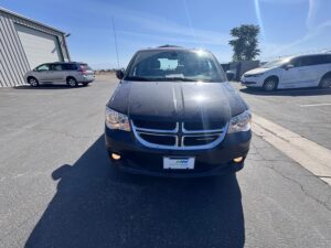 Black Dodge Grand Caravan with Driverge Rear Entry Manual Fold Out conversion