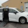 White Chrysler Voyager with Driverge Side Entry Automatic Fold Out conversion