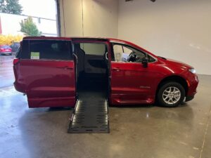 Red Chrysler Pacifica with BraunAbility Side Entry Automatic Fold Out conversion