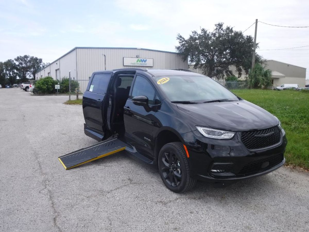 Black Chrysler Pacifica with Driverge Side Entry Automatic Fold Out conversion