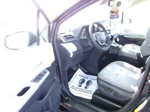 Black Toyota Sienna with BraunAbility Side Entry Automatic Fold Out conversion