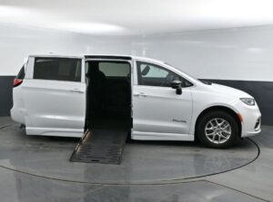 White Chrysler Pacifica with BraunAbility Side Entry Automatic Fold Out conversion
