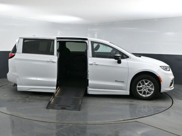 White Chrysler Pacifica with BraunAbility Side Entry Automatic Fold Out conversion