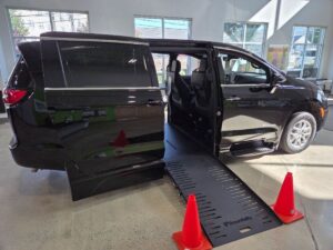 Black Chrysler Pacifica with BraunAbility Side Entry Automatic Fold Out conversion