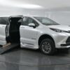 White Toyota Sienna with BraunAbility Side Entry Automatic Fold Out conversion