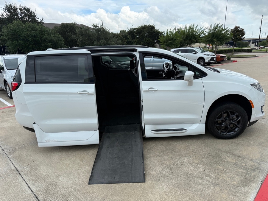 White Chrysler Pacifica with Vantage Mobility Side Entry Automatic In Floor conversion