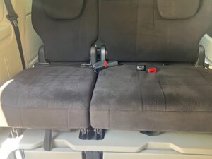 Black Dodge Grand Caravan with BraunAbility Side Entry Automatic Fold Out conversion