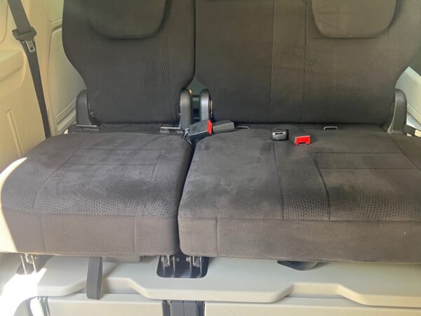 Black Dodge Grand Caravan with BraunAbility Side Entry Automatic Fold Out conversion