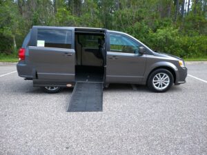 Grey Dodge Grand Caravan with Adaptive Vans Side Entry Automatic Fold Out conversion