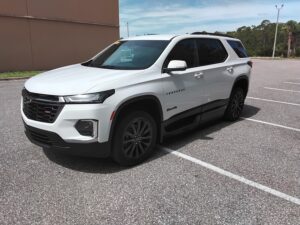White Chevrolet Traverse with BraunAbility Side Entry Automatic In Floor conversion