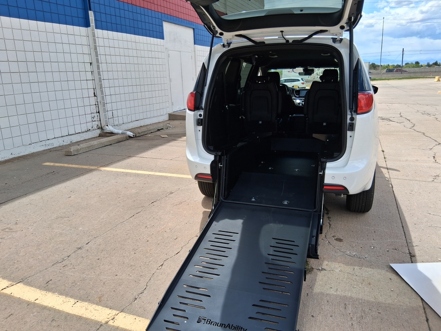 White Chrysler Voyager with BraunAbility Rear Entry Manual Fold Out conversion