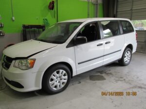 White Dodge Grand Caravan with BraunAbility Rear Entry Manual Fold Out conversion