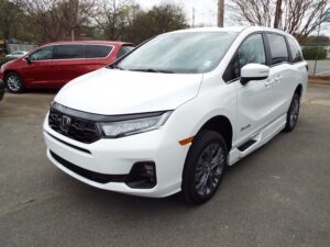 White Honda Odyssey with BraunAbility Side Entry Automatic In Floor conversion