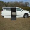 White Chrysler Pacifica with BraunAbility Side Entry Automatic Fold Out conversion