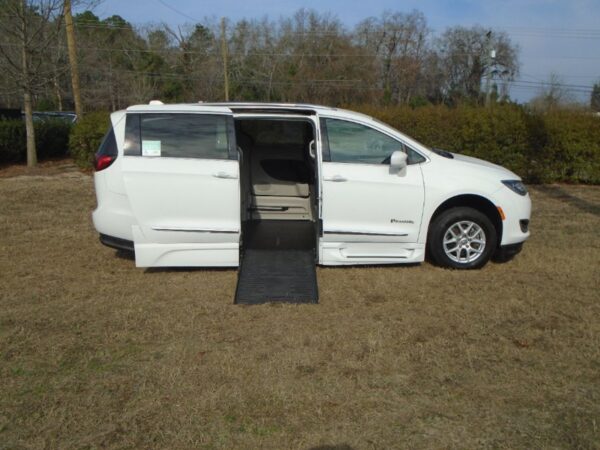 White Chrysler Pacifica with BraunAbility Side Entry Automatic Fold Out conversion