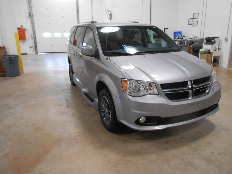 Silver Dodge Grand Caravan with Vantage Mobility Side Entry Automatic Fold Out conversion