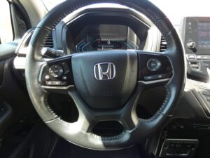 Grey Honda Odyssey with BraunAbility Side Entry Automatic In Floor conversion