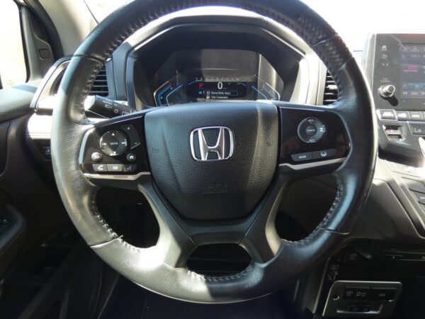 Grey Honda Odyssey with BraunAbility Side Entry Automatic In Floor conversion