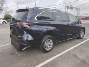 Blue Toyota Sienna with Driverge Rear Entry Manual Fold Out conversion