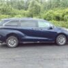 Blue Toyota Sienna with Driverge Rear Entry Manual Fold Out conversion