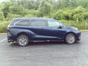 Blue Toyota Sienna with Driverge Rear Entry Manual Fold Out conversion