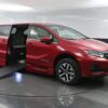 Red Honda Odyssey with BraunAbility Side Entry Automatic In Floor conversion