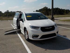 White Chrysler Pacifica with BraunAbility Side Entry Automatic Fold Out conversion