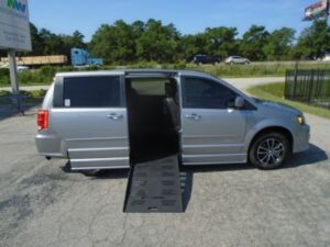 Silver Dodge Grand Caravan with BraunAbility Side Entry Automatic Fold Out conversion